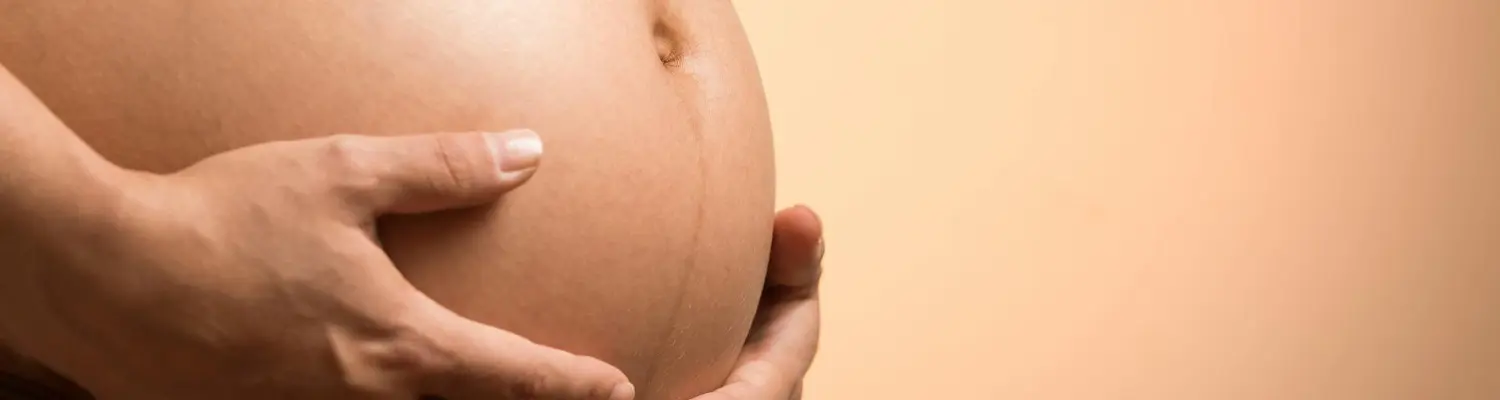 A pregnant person belly as a symbol of "can i take oxycodone and breastfeeding?"